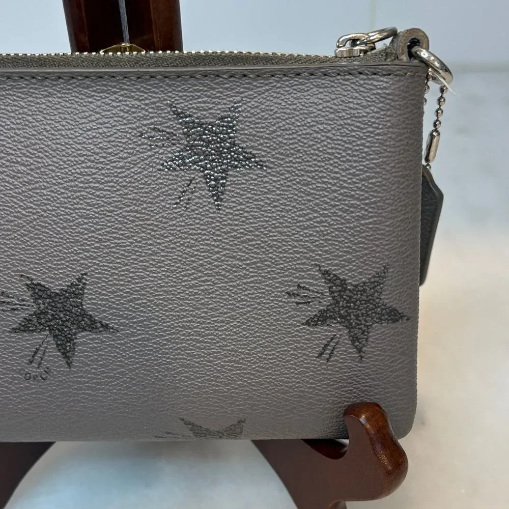 Coach Saffiano Leather Metallic Silver Star-Pattern Wristlet
